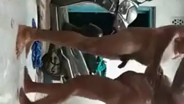 Desi couple thinks outdoor XXX shower won't hurt before sex