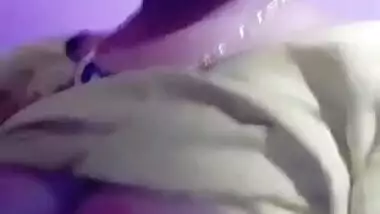 Attractive Indian teen gladly plays with her XXX boobs and nipples