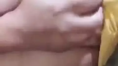 Naughty Indian teen records solo porn clip in which she plays with jugs