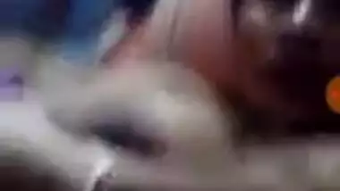 Awesome Indian aunty temptingly lies in bed and plays with knockers