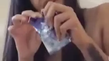 Teen exposes her XXX body and prepares a condom for subsequent sex
