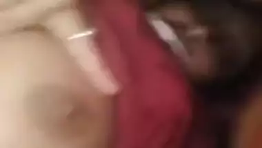 Lecherous Desi gal demonstrating her tits online under the blanket