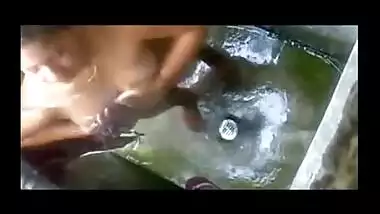 Peeping tom with records Indian bhabhi outdoor bath