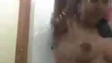 Pretty Desi chick with natural XXX boobs seductively washes herself