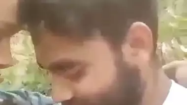 Indian outdoor sex of a guy sucking his GF’s tight boobs