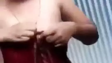 Slutty teen gal exposes perky Desi tits and cute twat in XXX clip