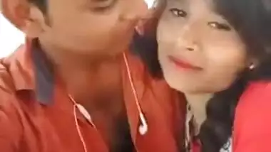 Handsome young man paws Indian's perfect boobs through red dress
