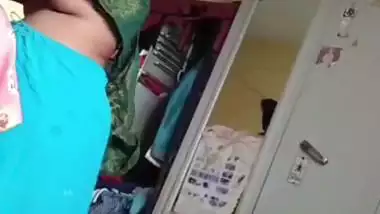 Grandmother wearing blouse and showing naked boobs