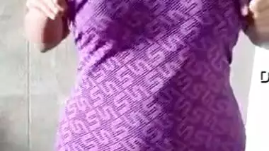 Desi slut takes off swimsuit to show her XXX tits in the mirror