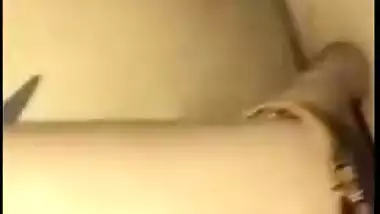 Young gal in red lingerie teases her XXX Desi pussy for the camera