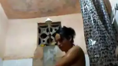 Nude Indian woman relaxes solo in the shower in amateur porn clip